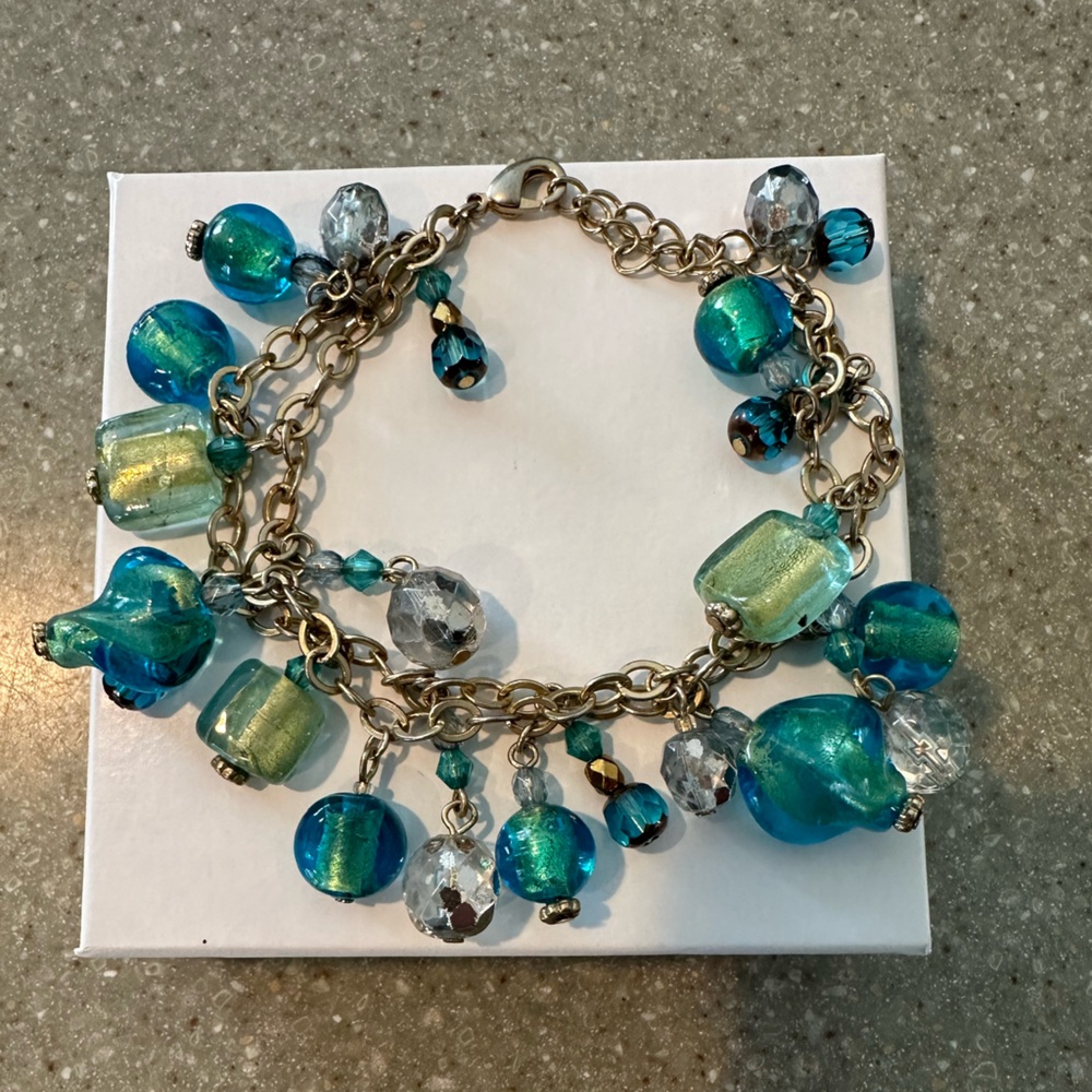 Elegant Blue and Gold Charm Bracelet